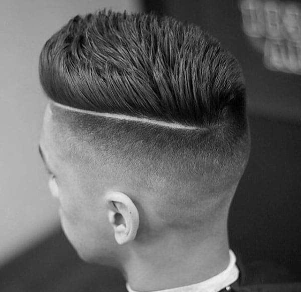Spiky Hard Part Mens Hairstyle With Low Fade On Sides