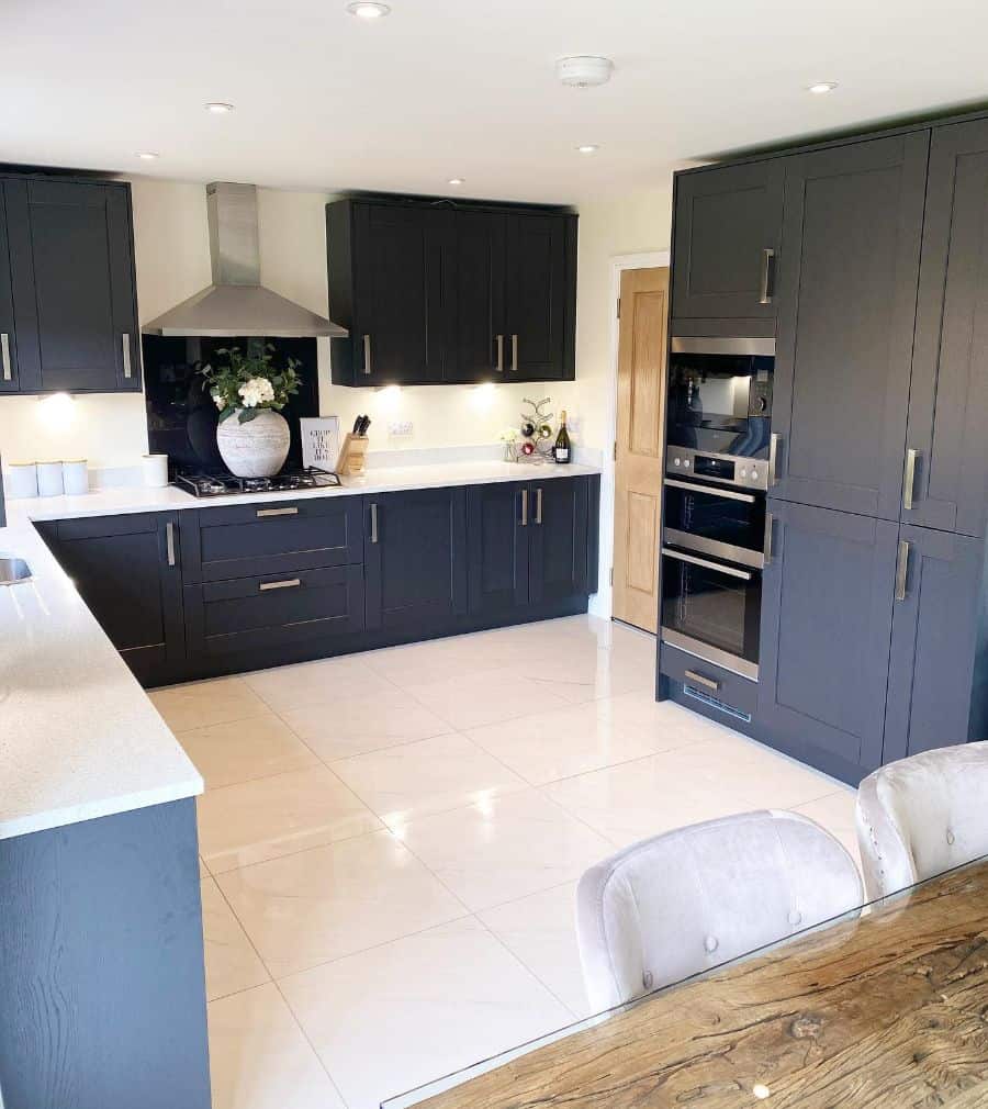 black cabinet kitchen white square floor tiles