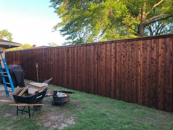 stained wooden privacy fence