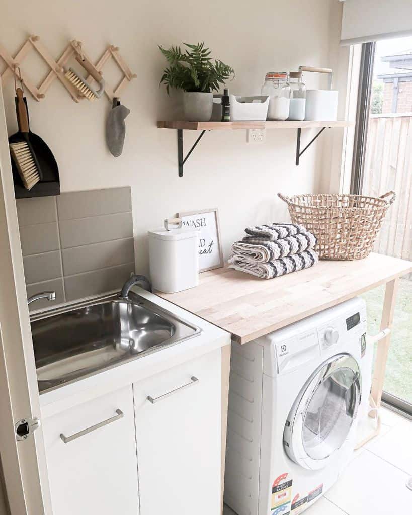 stainless steel sink in country style laundry