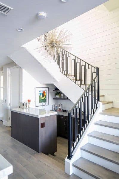 black ornate metal stair railing