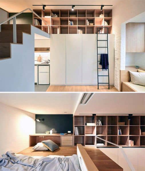 Compact studio with staircase storage, a lofted bed, and built-in shelving for efficient use of space.