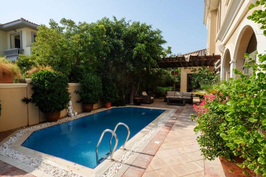 stamped patio pool backyard