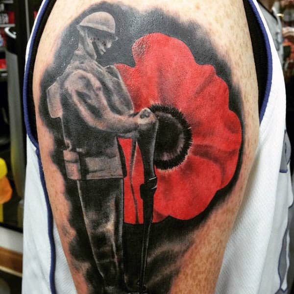 Standing Solider Red Poppy Tattoo Upper Arm For Guys