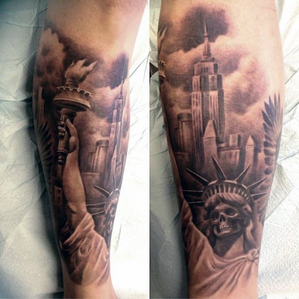 Statue Of Liberty Empire State Building Tattoo On Mans Forearm