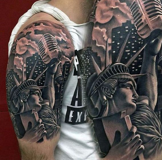 Statue Of Liberty Holding Microphone Tattoo Guys Arms