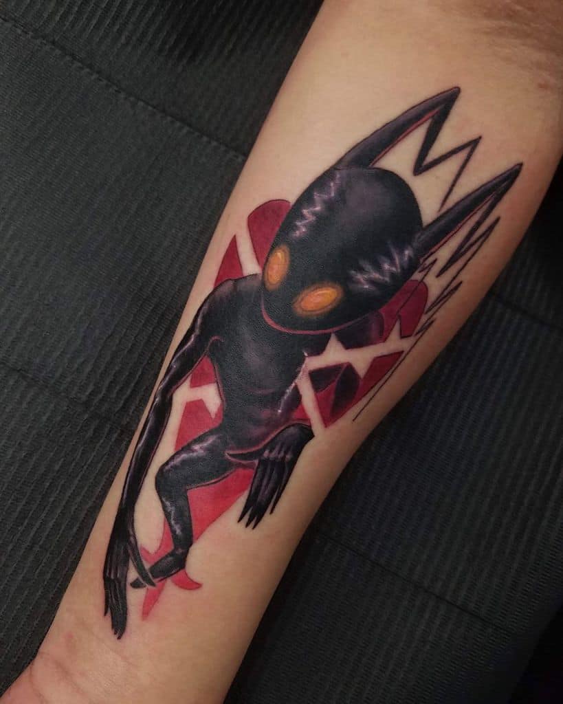 Dark-themed Kingdom Hearts tattoo of a Shadow Heartless with glowing eyes, sharp details, and a red geometric background on the forearm.