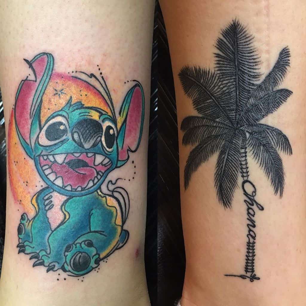 Colorful tattoo of Stitch with a palm tree and 'Ohana' written below, representing family, Hawaiian culture, and a playful spirit.