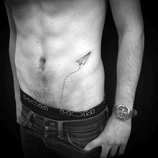 Stomach And Rib Cage Male Flying Paper Airplane Tattoos