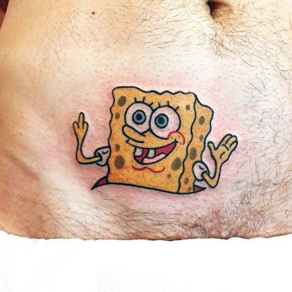 Funny SpongeBob tattoo on the stomach showing him half-popped out with a cheeky smile and hands raised in a playful pose.