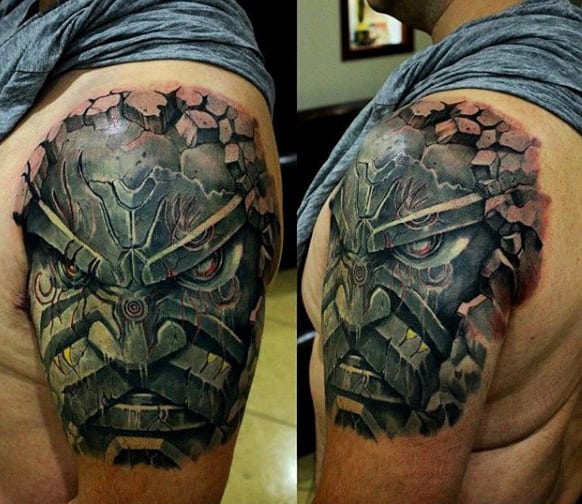 Stone Face Mens Upper Arm Tattoos