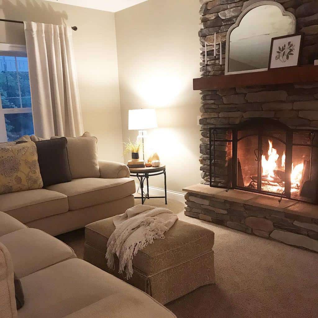 simple living room stone fireplace gray sofa