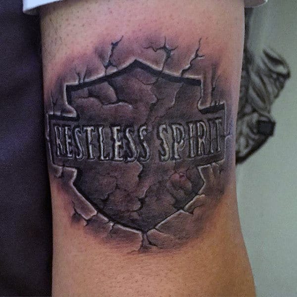 Stone Harley Davidson Logo With Restless Spirit Guys Tattoo