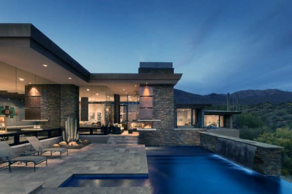 Stone Home Swimming Pool With Waterfall Wall