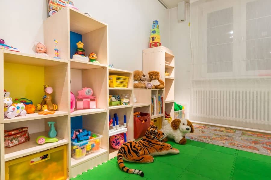 wood cabinet storage in playroom