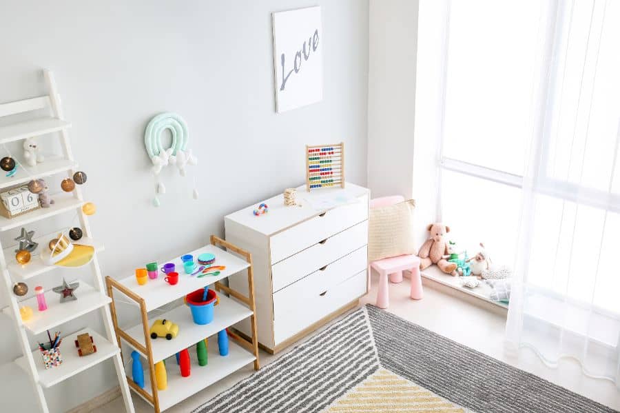 kids room with white cabinet storage options