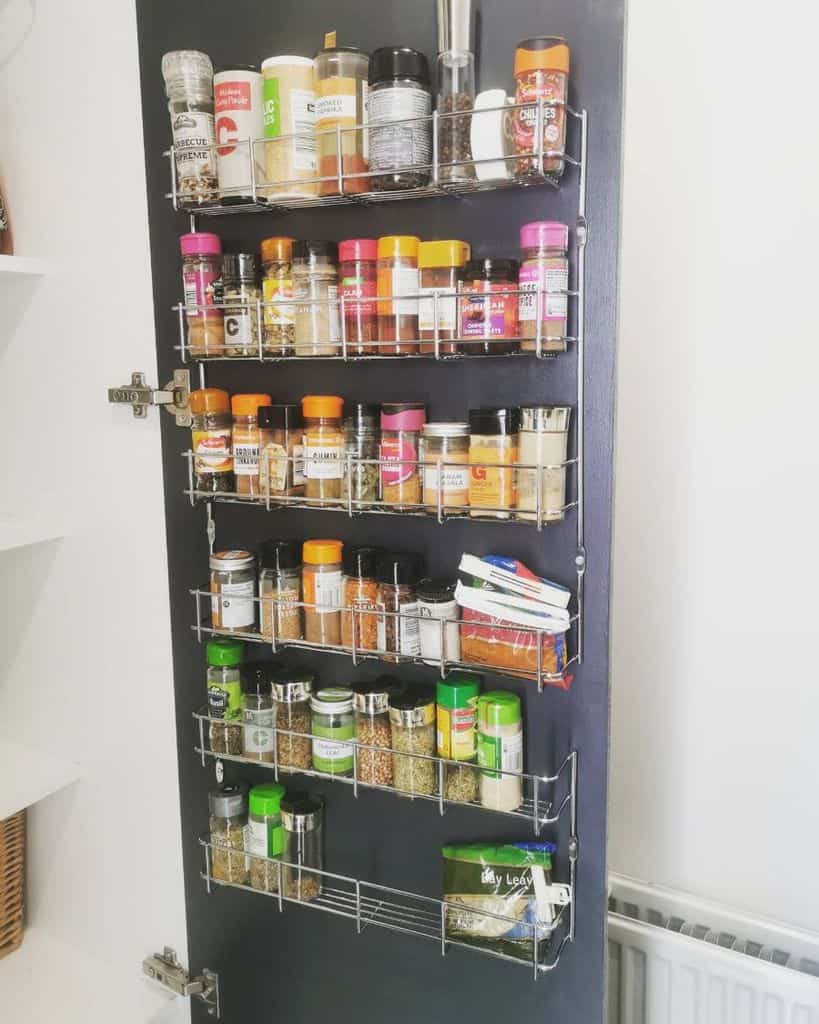 wire spice rack on pantry door