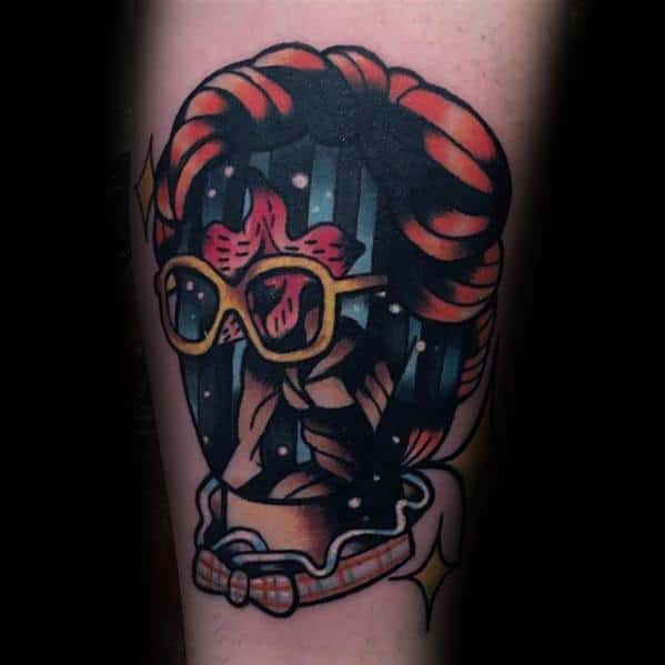 Bold neo-traditional tattoo of the Demogorgon wearing Barb’s hairstyle, glasses, and outfit, blending horror and humor from Stranger Things.