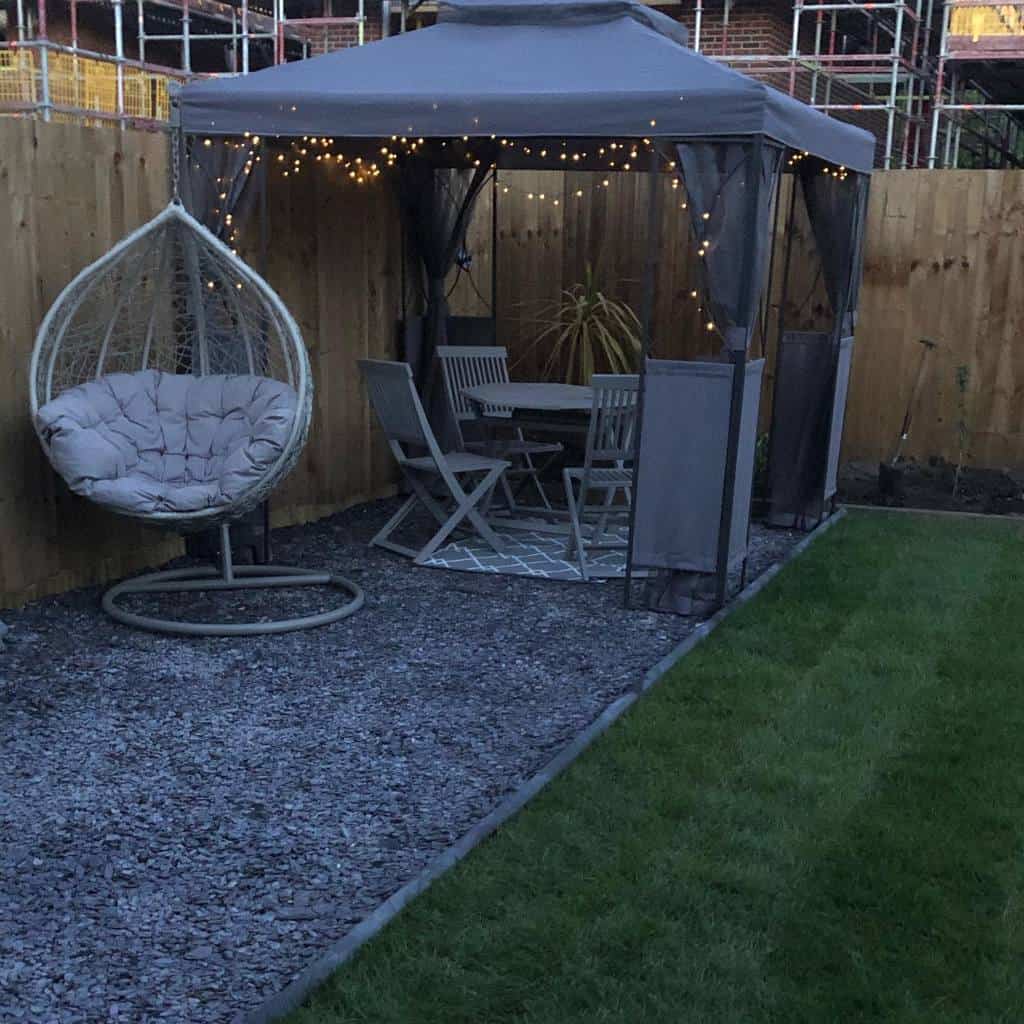 backyard gazebo with egg seat