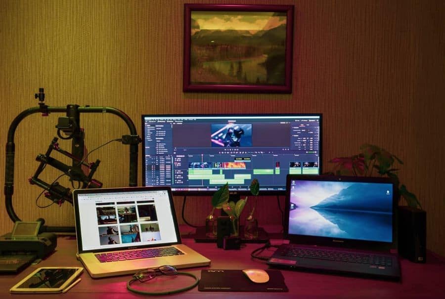 studio desk setup two macs one monitor