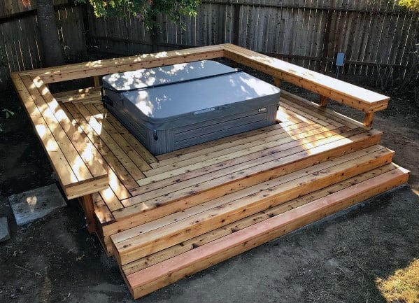 elevated wood deck with hot tub