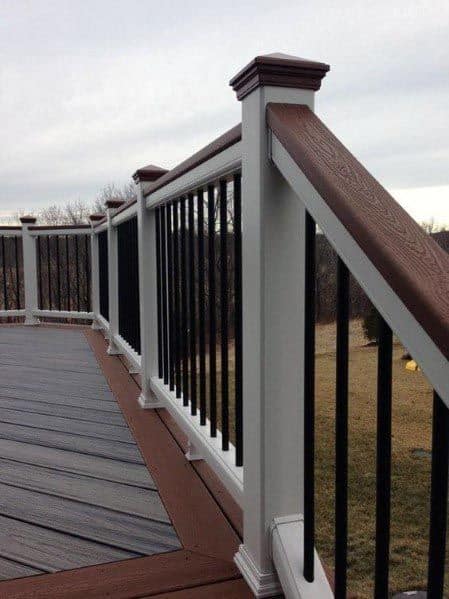 white posts black metal balusters deck railing