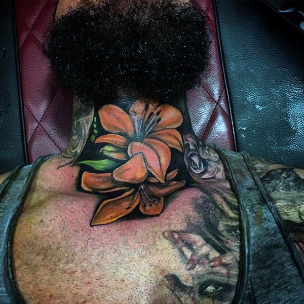Vivid throat tattoo of orange lilies with green leaves, blending into surrounding black ink for a bold and striking floral design