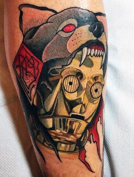 Bold C-3PO tattoo with a geometric design, featuring a fierce wolf headdress and red accents for a striking, artistic contrast.