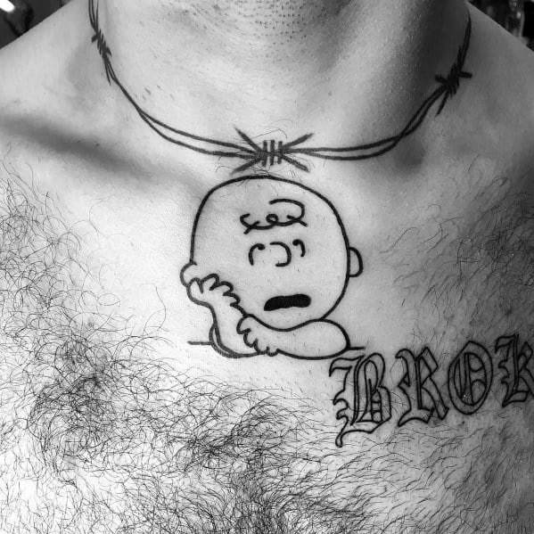 Bold Charlie Brown tattoo featuring him resting his head under a barbed wire necklace, blending nostalgia with a raw, edgy aesthetic.