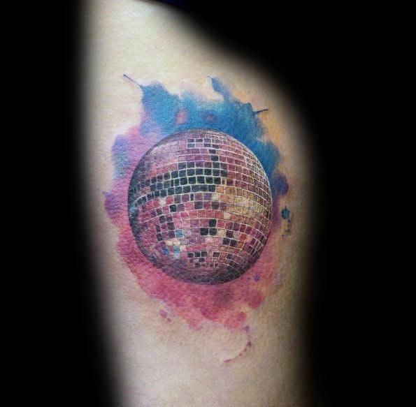 Vibrant disco ball tattoo with a watercolor splash background, blending bold colors and retro aesthetics for a dynamic, artistic look.