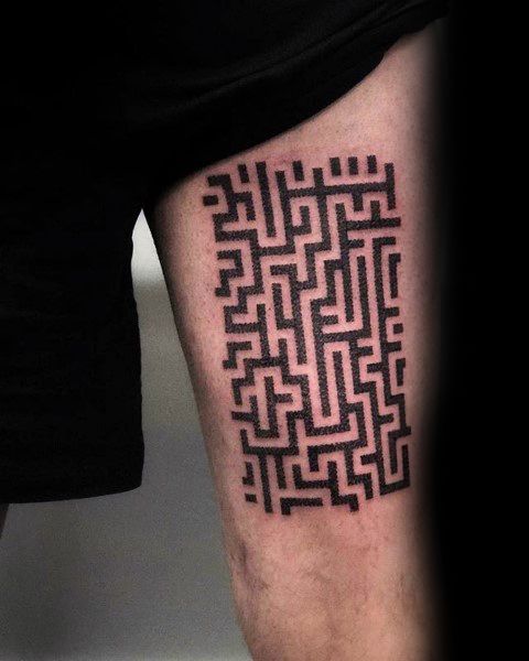 Minimalist black ink labyrinth tattoo on a man's thigh, featuring a rectangular maze design with bold, geometric lines and sharp edges.