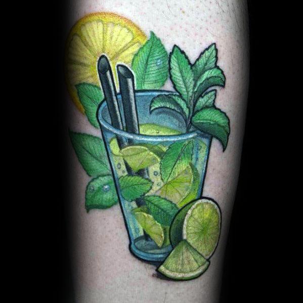 Realistic mojito tattoo featuring a glass with lime slices, mint leaves, ice cubes, and straws, creating a fresh and vibrant cocktail-inspired design.