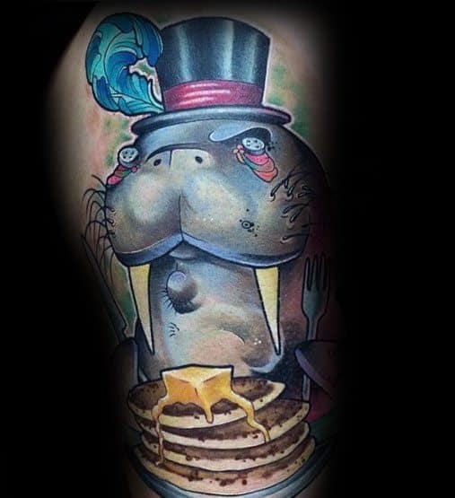 Whimsical tattoo featuring a dapper walrus in a top hat with monocle-style buttons, eagerly awaiting a stack of pancakes dripping with syrup.