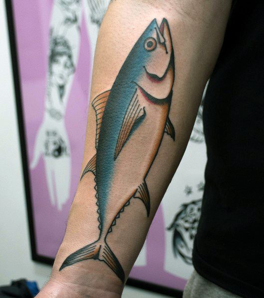 Bold and clean tuna fish tattoo on a man's forearm, featuring smooth shading, sharp outlines, and a minimalist yet striking design.