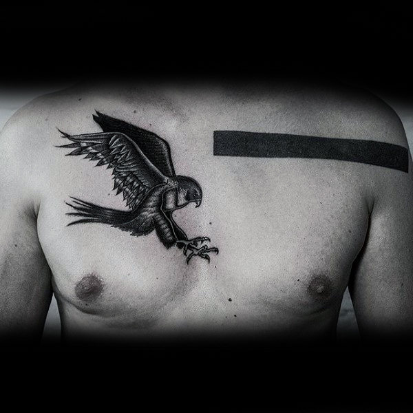 Stylized Blackwork Hawk Tattoo For Guys Chest