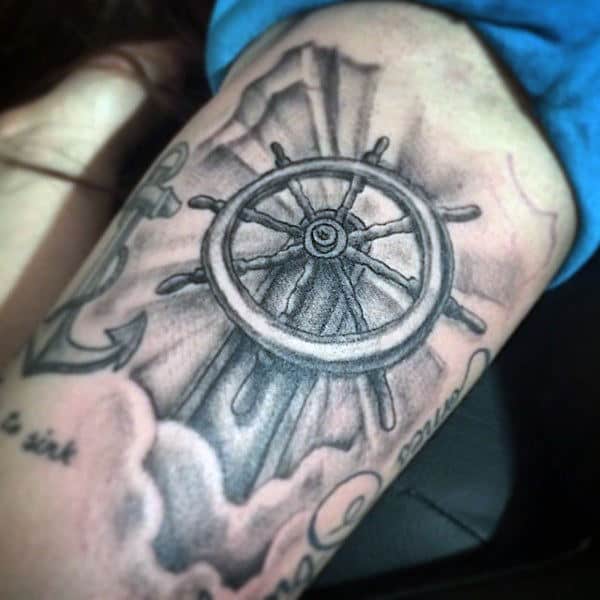 Sun Ray And Clouds Mens Ship Wheel Tattoo Design On Mens Thigh