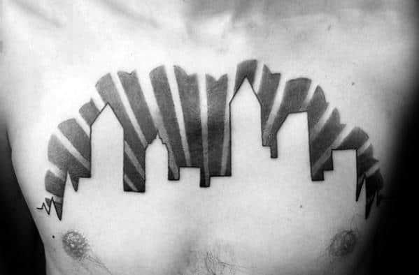 Sun Rays Over Skyline Mens Negative Space Upper Chest Tattoo Ideas