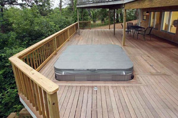 sunken hot tub outdoor wood deck pergola