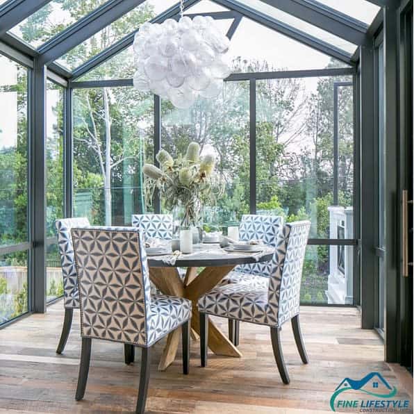 enclosed glass patio round table pattern fabric chairs chandelier