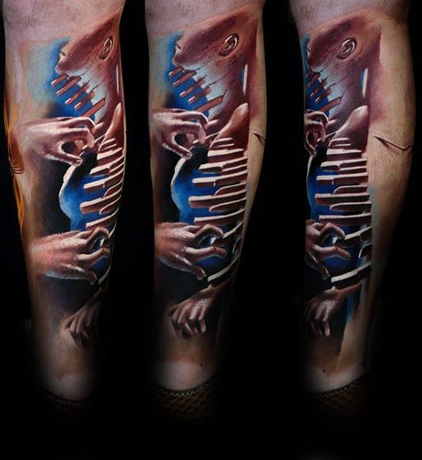 Surreal tattoo of a figure playing melting piano keys, with intertwined hands and abstract blue accents flowing down the leg.