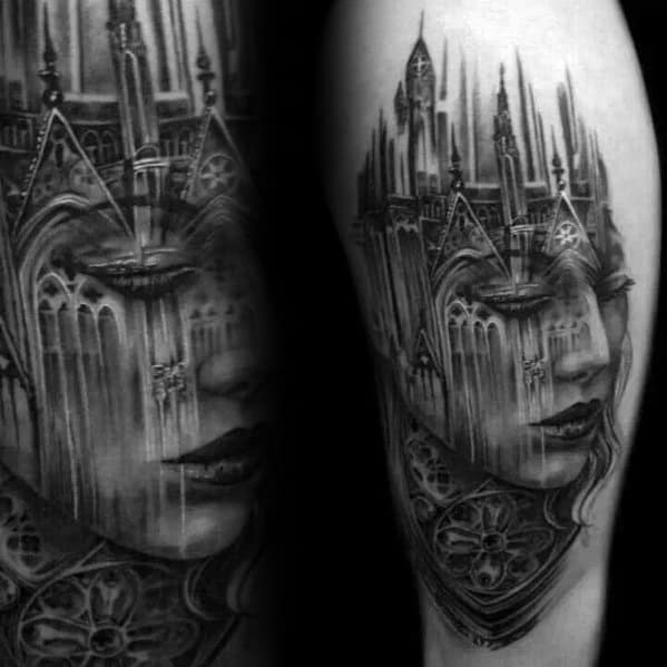 Black and grey surreal tattoo blending a woman's face with Gothic cathedral architecture, featuring spires, arches, and rose windows.