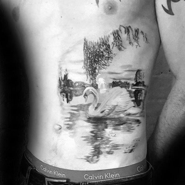 Impressionist-style swan tattoo on the ribs, depicting a serene lake scene with soft shading and painterly brushstroke effects.