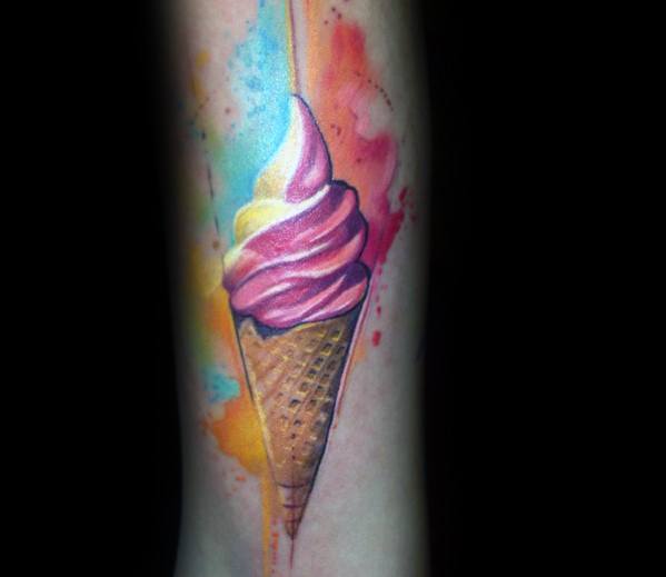 Vibrant tattoo of a soft-serve ice cream cone with pink and white swirls, surrounded by a colorful watercolor splash for a dynamic and artistic look.