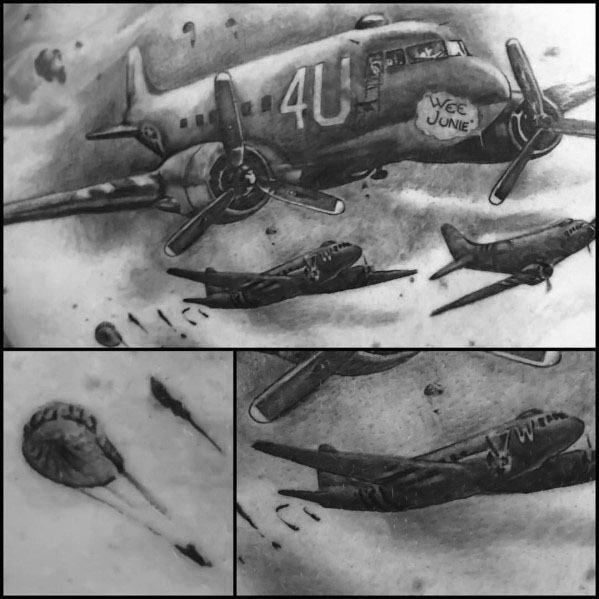 Realistic black and grey tattoo of WWII paratrooper planes in flight, featuring detailed shading, motion effects, and parachutes for a historical aviation theme.
