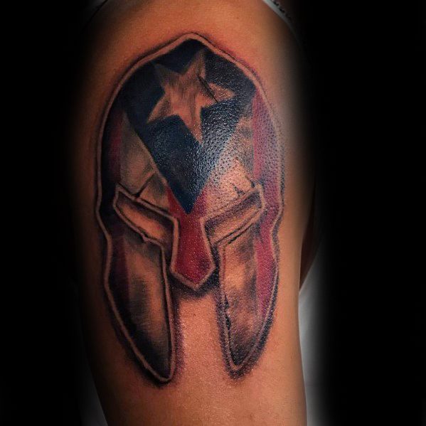 Puerto Rican flag tattoo integrated into a Spartan helmet design, symbolizing strength, heritage, and national pride.