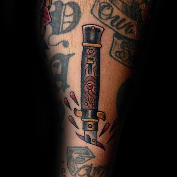 Switchblade Mens Tattoo Designs On Arm