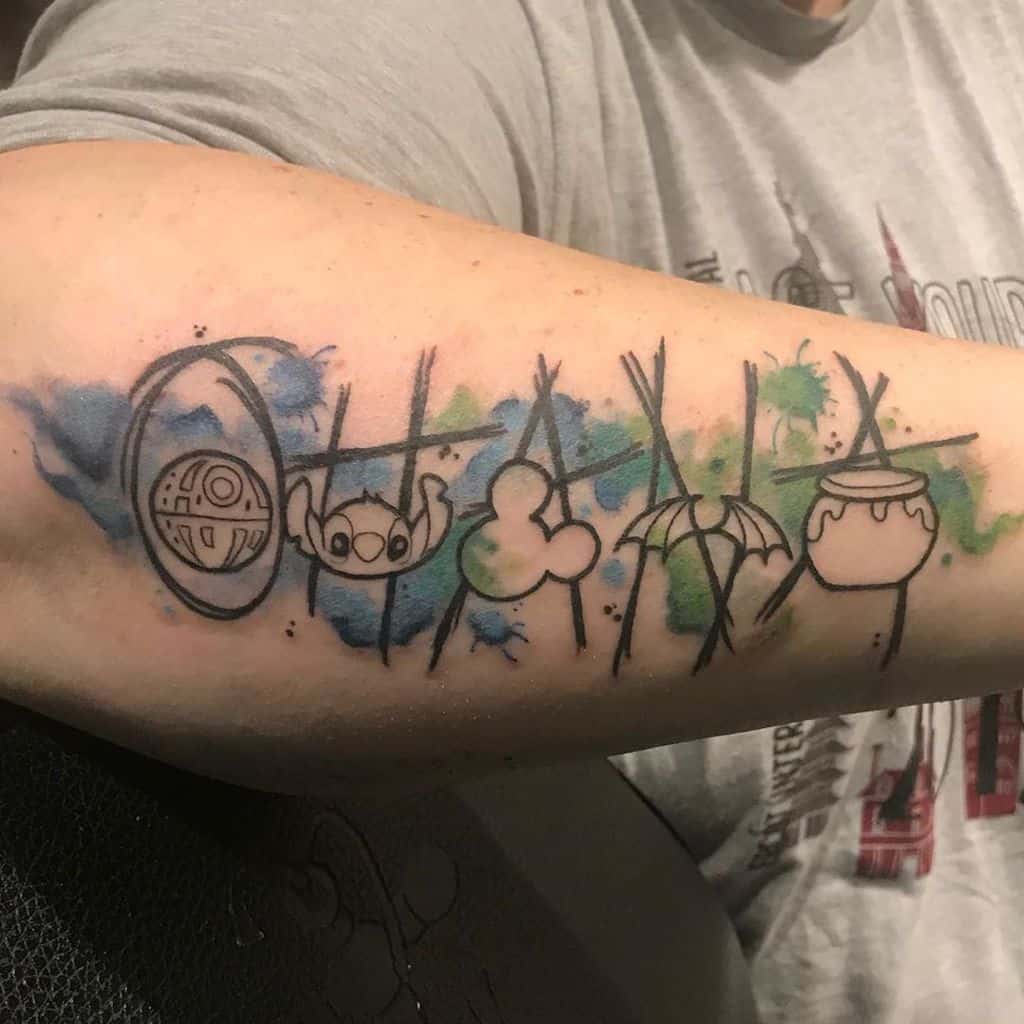 Watercolor tattoo of 'Ohana' with Disney-inspired symbols, blending family, nostalgia, and love for pop culture.