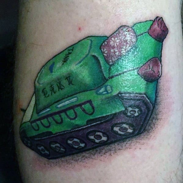 Tattoo of a green firecracker tank with intricate shading and Chinese characters, blending military and fireworks themes in a bold, detailed design.