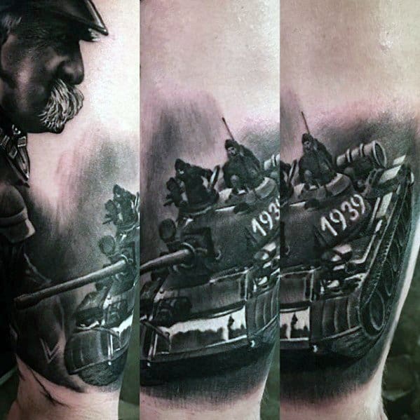 Realistic black and grey tattoo of a WWII tank with soldiers, marked “1939,” showing intense shading and dramatic battlefield movement.