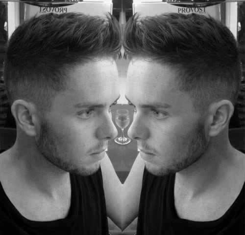 Taper Fade Faux Hawk Hairstyle For Males